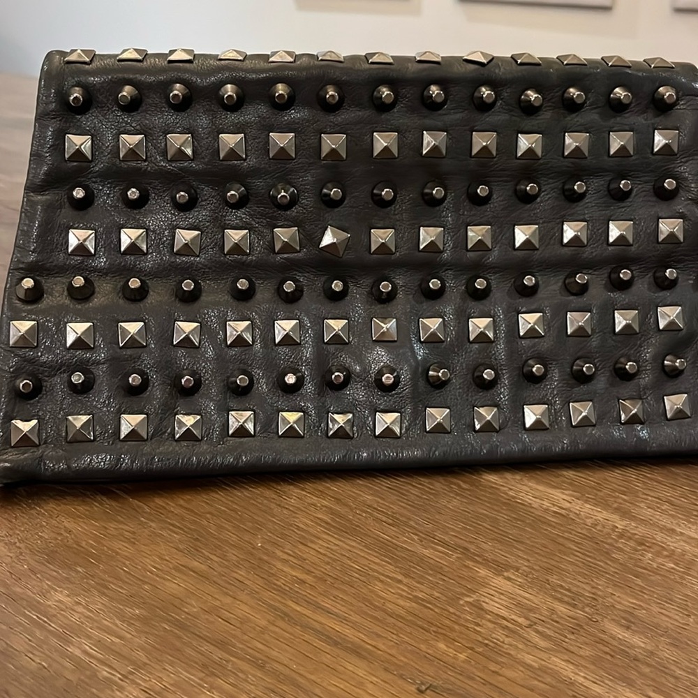 Romy Gold studded black clutch